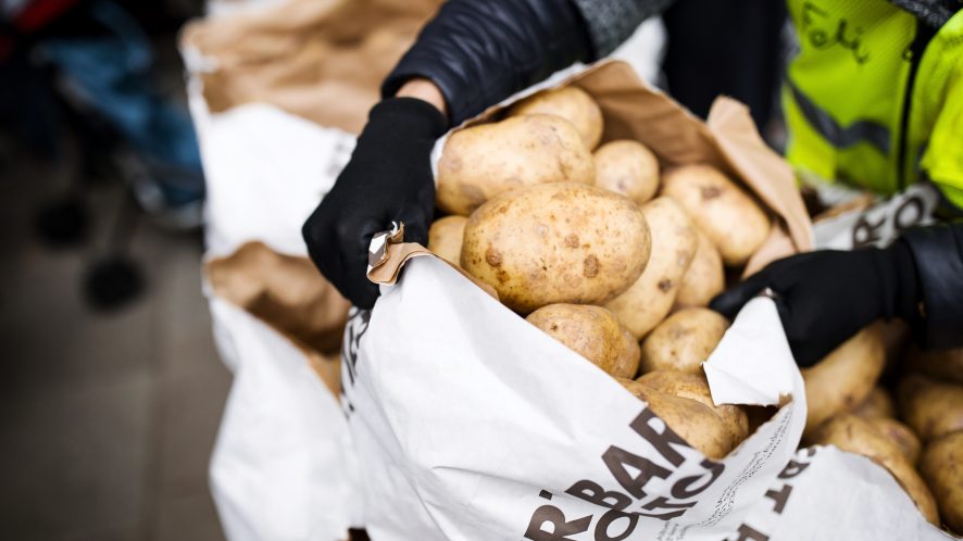 Top down shot of an open sack of potatoes