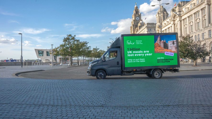A Felix branded ad van reading "1 billion UK meals are lost every year, help us get them back on the table" sits parked outside the 2026 Labour Party Conference in Liverpool